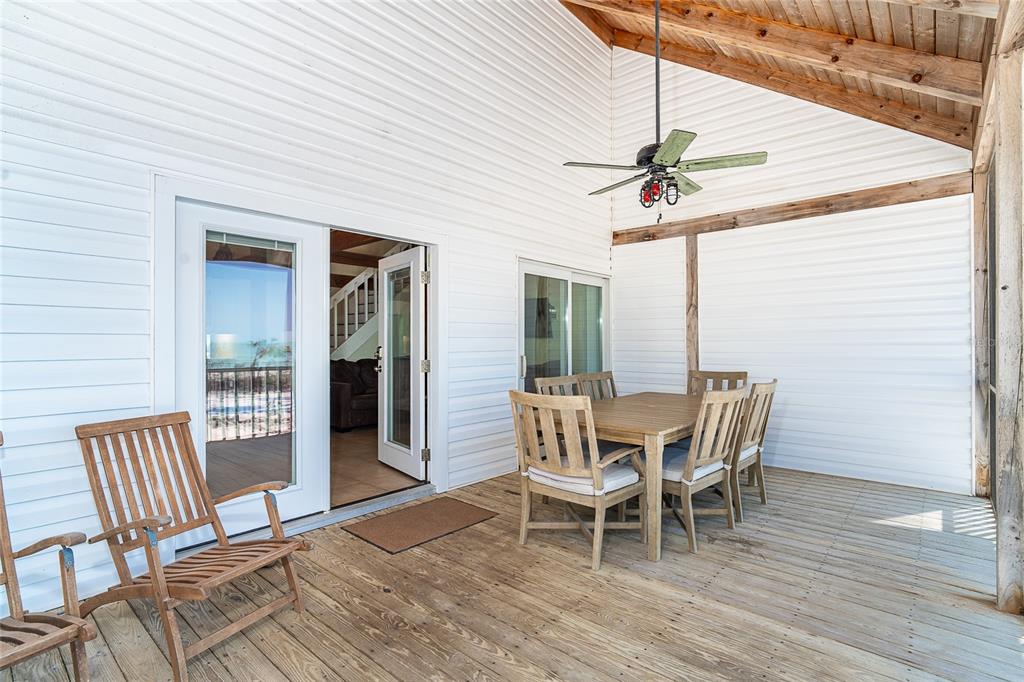 360 South Gulf Boulevard Boca Grande, FL 33921 - Photo 4 of 64 a dining room with furniture window and wooden floor