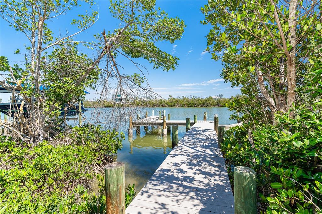 360 South Gulf Boulevard Boca Grande, FL 33921 - Photo 43 of 64 a view of a lake with sitting area