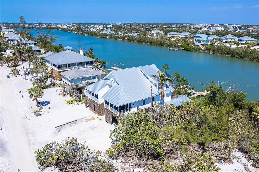 360 South Gulf Boulevard Boca Grande, FL 33921 - Photo 53 of 64 an aerial view of a house with a lake view