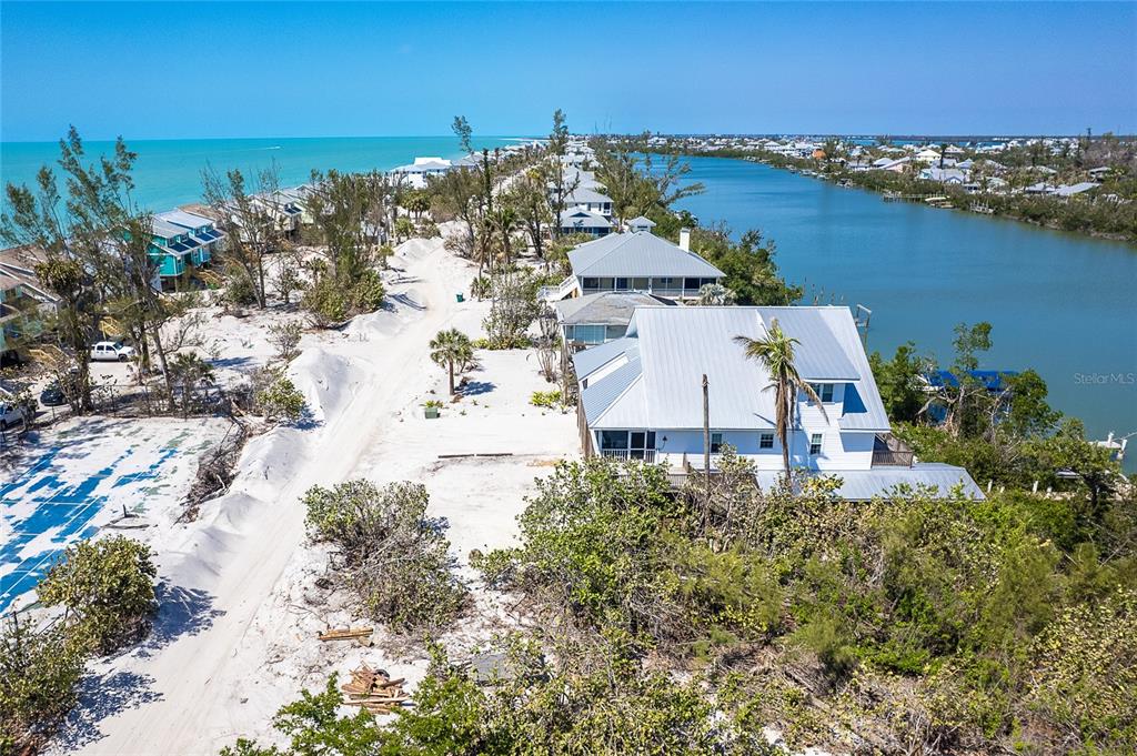 360 South Gulf Boulevard Boca Grande, FL 33921 - Photo 54 of 64 an aerial view of a house with a lake view