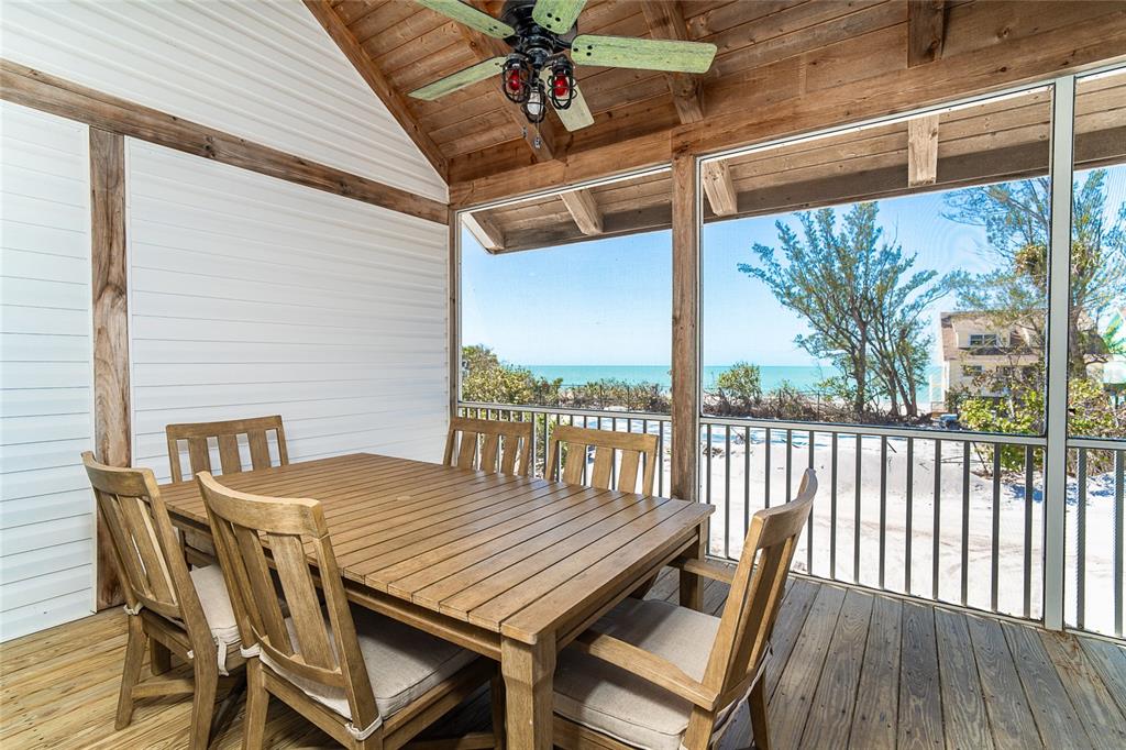 360 South Gulf Boulevard Boca Grande, FL 33921 - Photo 6 of 64 a view of a patio with table and chairs