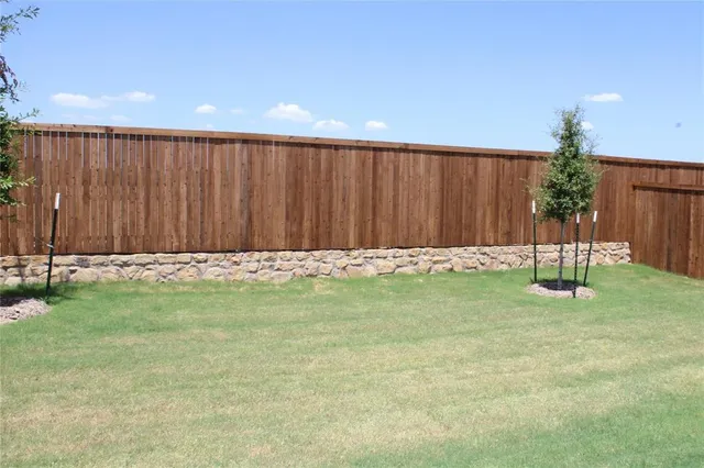 a view of a backyard with a garden