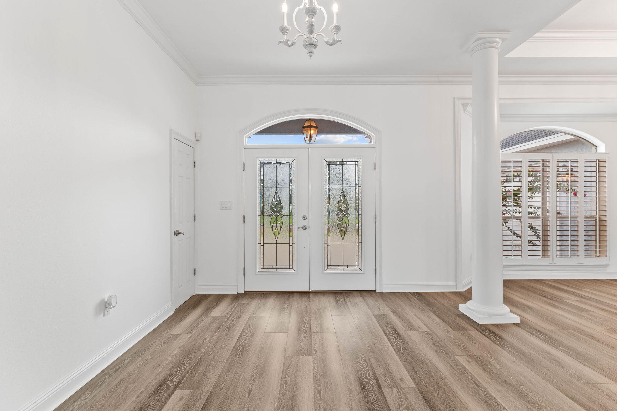 1780 Driftwood Point Road Santa Rosa Beach, FL 32459 - Photo 42 of 101 a view of empty room with wooden floor and fan