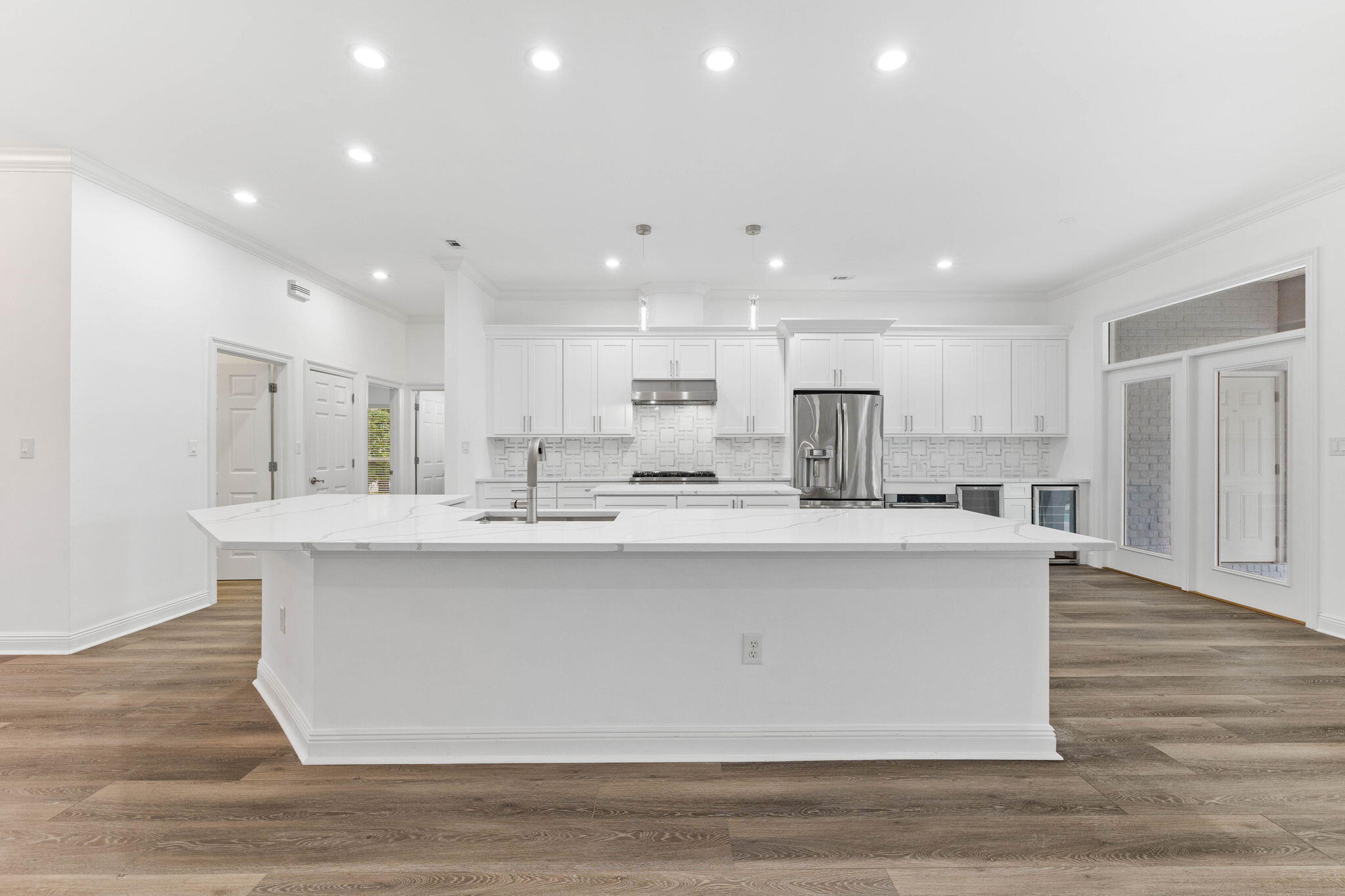 1780 Driftwood Point Road Santa Rosa Beach, FL 32459 - Photo 46 of 101 a view of kitchen with stainless steel appliances granite countertop refrigerator oven sink and cabinets
