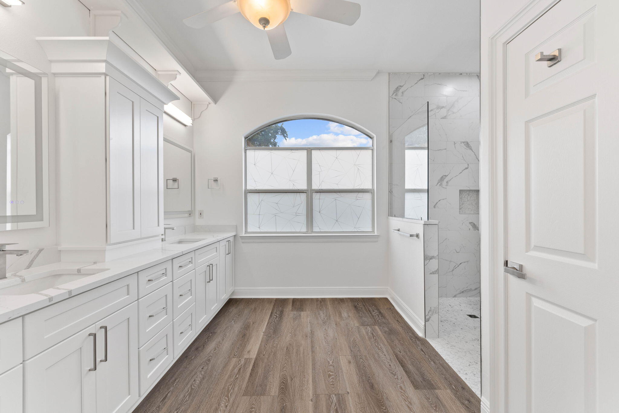 1780 Driftwood Point Road Santa Rosa Beach, FL 32459 - Photo 53 of 101 a bathroom with a sink a window and a mirror