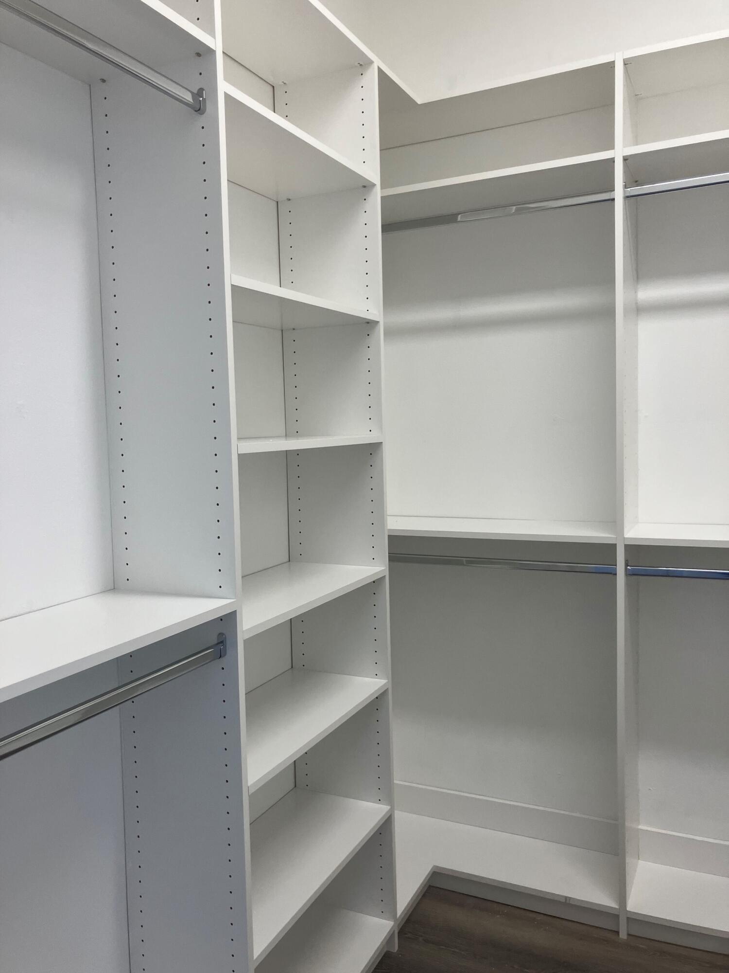 1780 Driftwood Point Road Santa Rosa Beach, FL 32459 - Photo 56 of 101 a view of walk in closet with empty racks