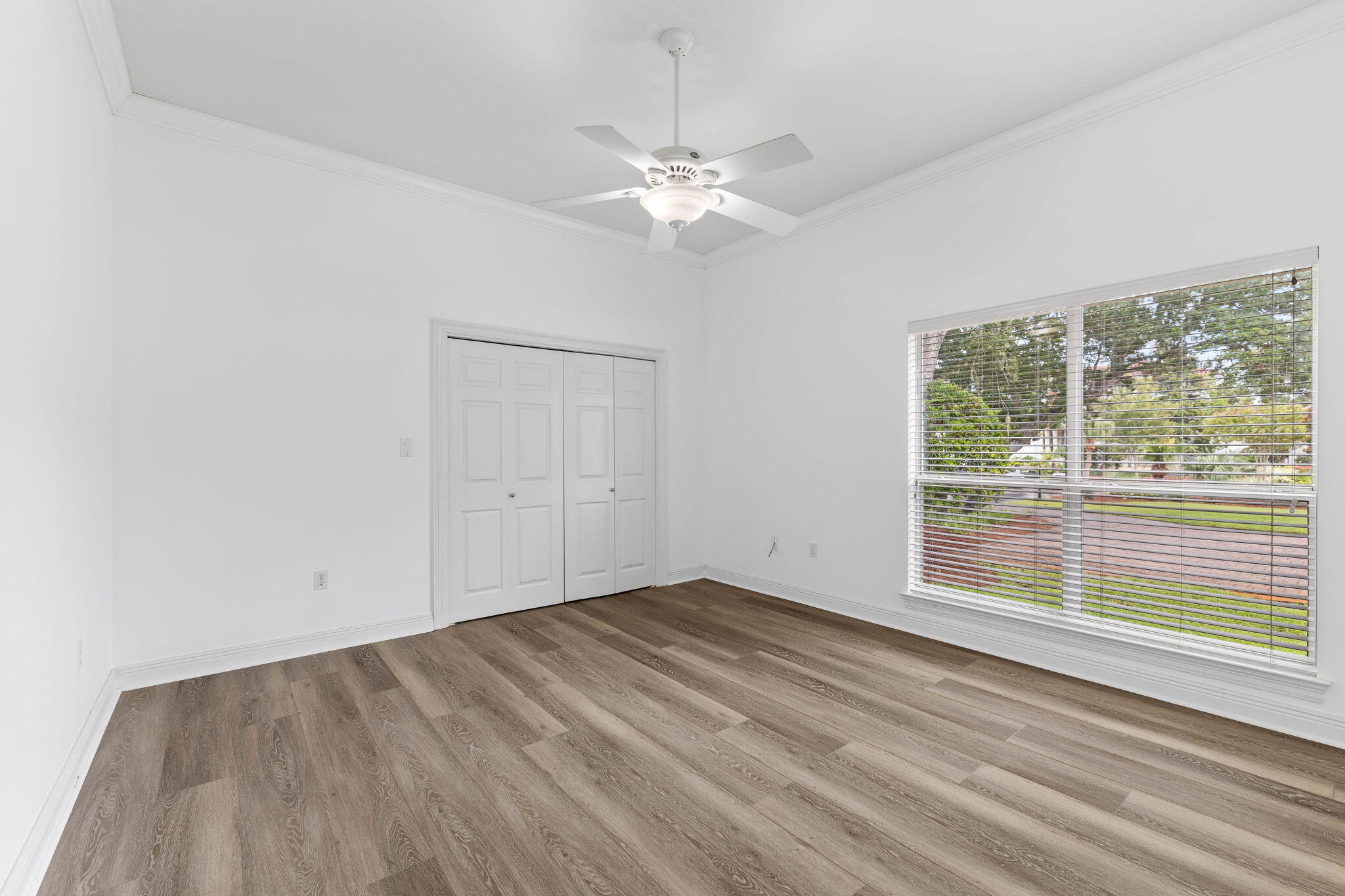 1780 Driftwood Point Road Santa Rosa Beach, FL 32459 - Photo 58 of 101 wooden floor in an empty room with a window