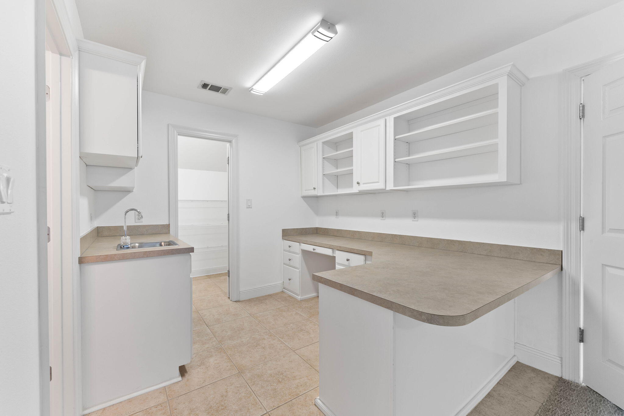1780 Driftwood Point Road Santa Rosa Beach, FL 32459 - Photo 69 of 101 a kitchen with stainless steel appliances granite countertop a sink stove and cabinets