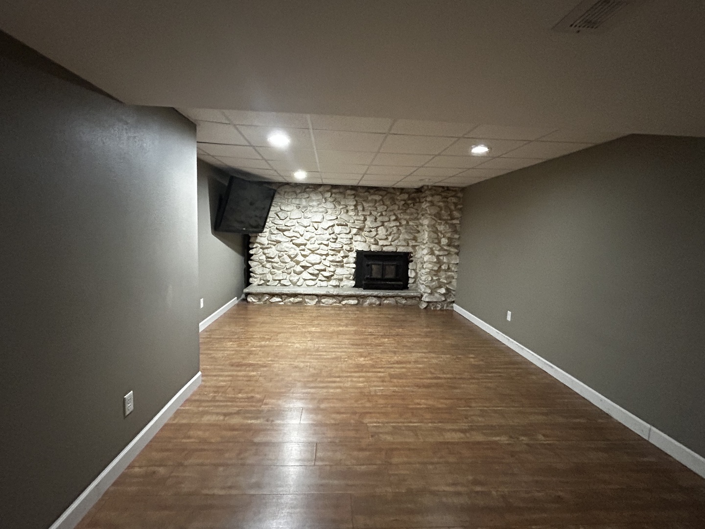 12795 Lawrence Road Sterling, IL 61081 - Photo 33 of 42 a view of an empty room with a fireplace