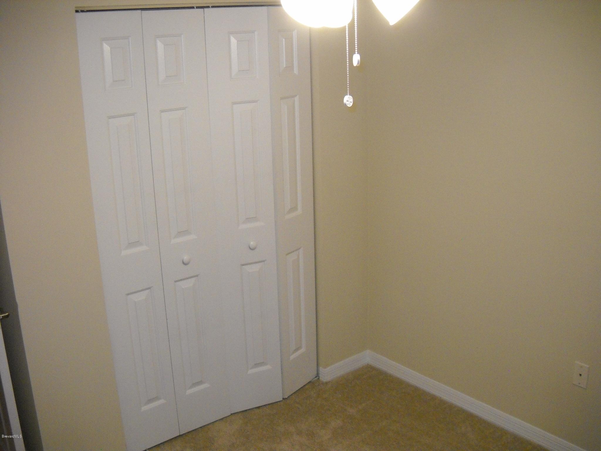 5037 Bridge Road Cocoa, FL 32927 - Photo 18 of 28 3rd bedroom closet view