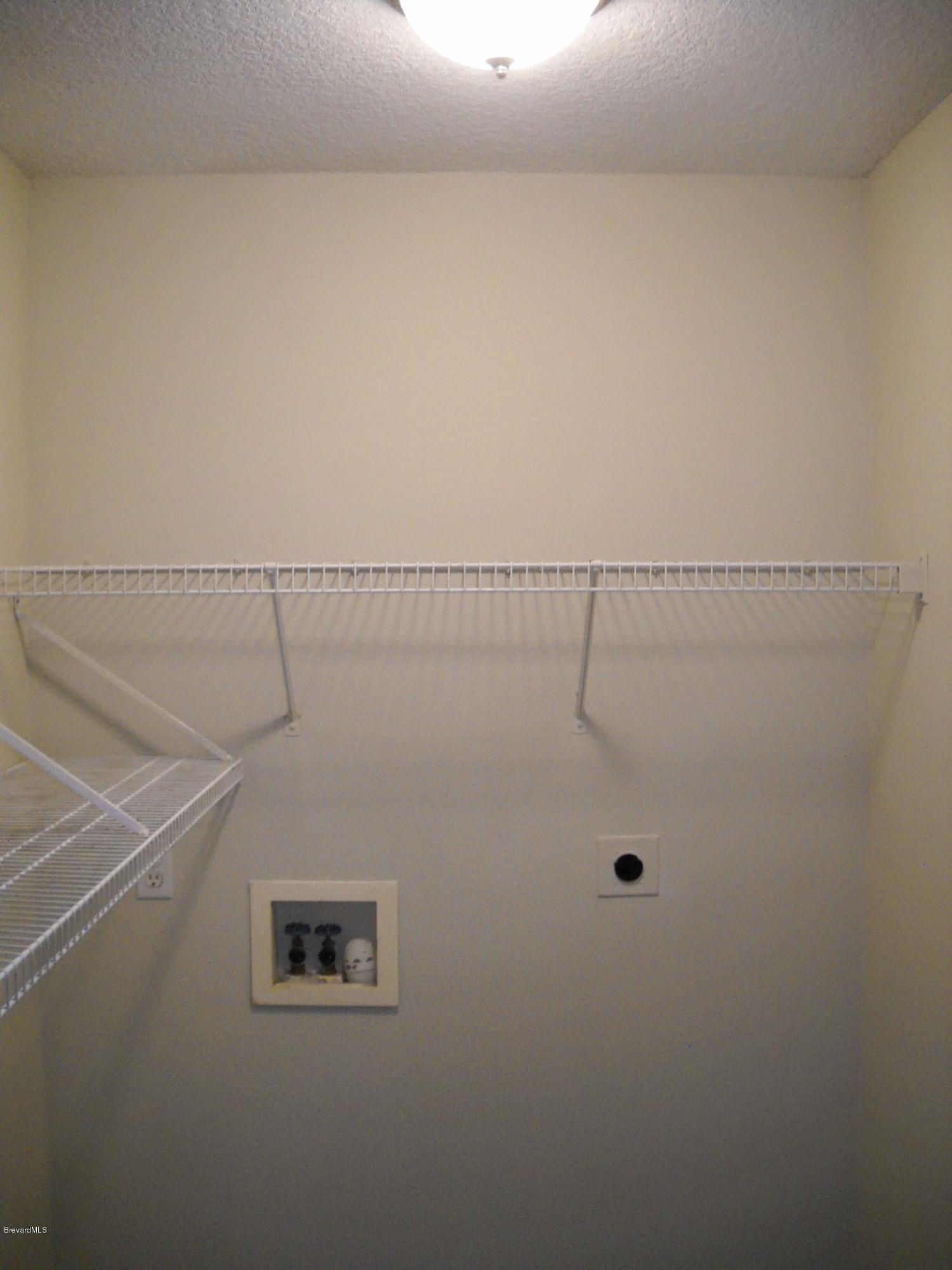 5037 Bridge Road Cocoa, FL 32927 - Photo 24 of 28 Laundry room view