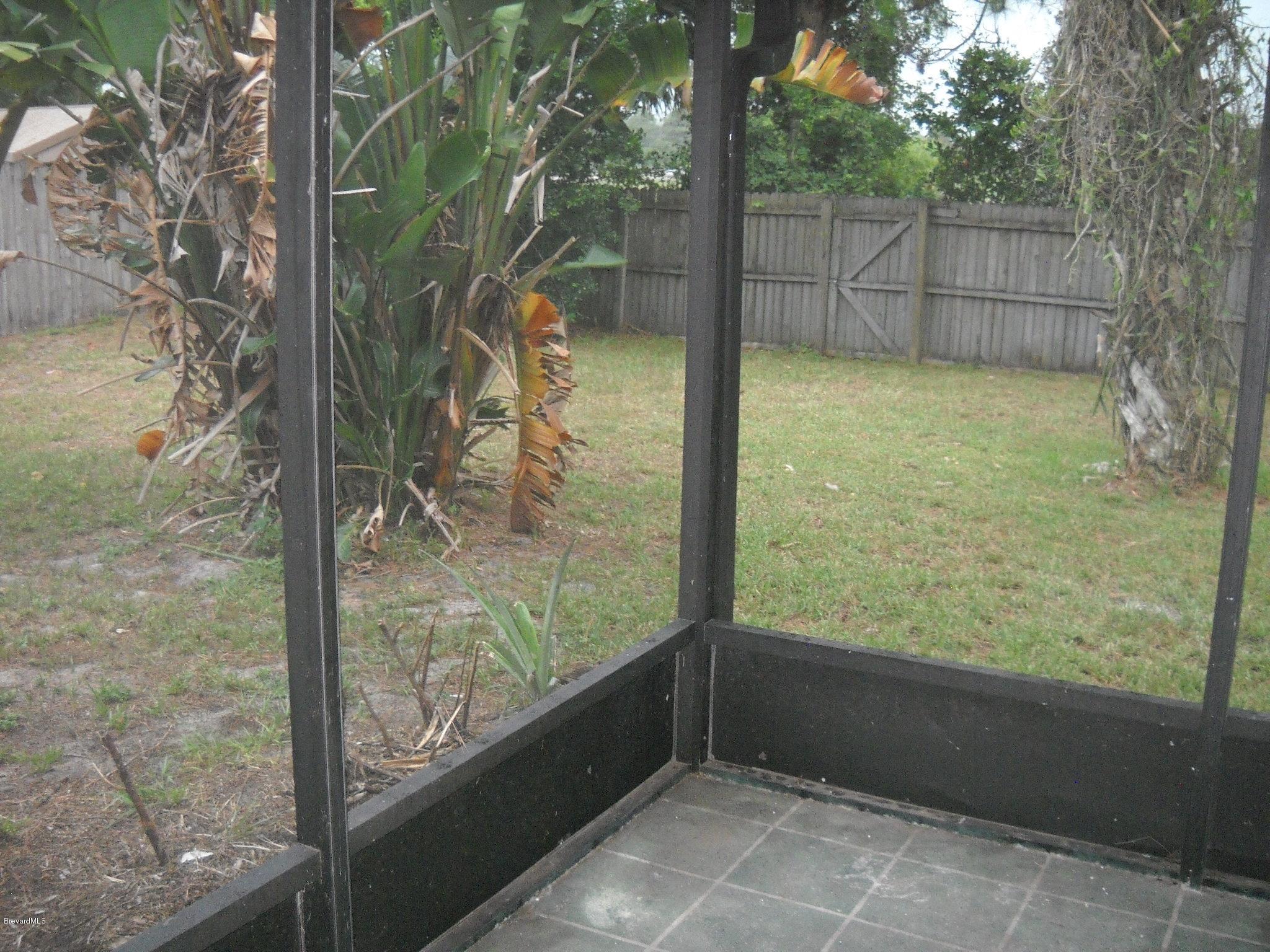 5037 Bridge Road Cocoa, FL 32927 - Photo 25 of 28 Screened porch view
