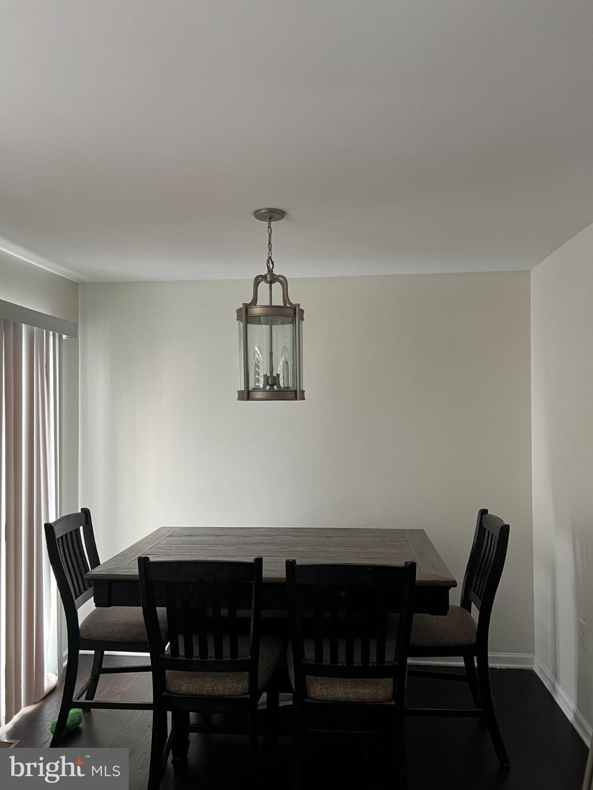 1132 Stallion Street Ranson, WV 25438 - Photo 5 of 13 Modern dining space with elegant lighting.