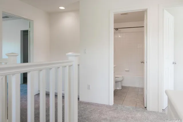 a bathroom with a toilet sink
