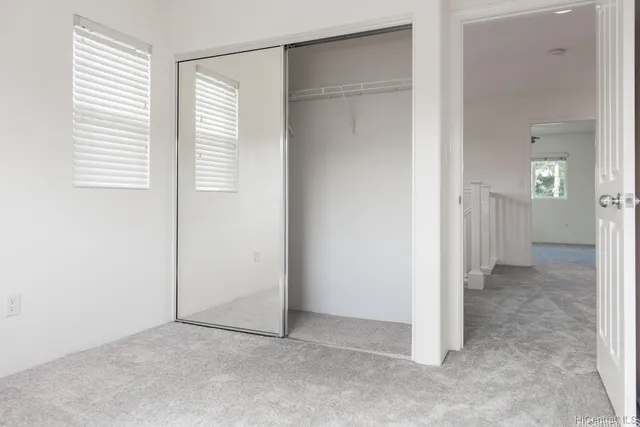 a view of a room with a hallway