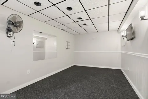 a view of a room with racks on the wall