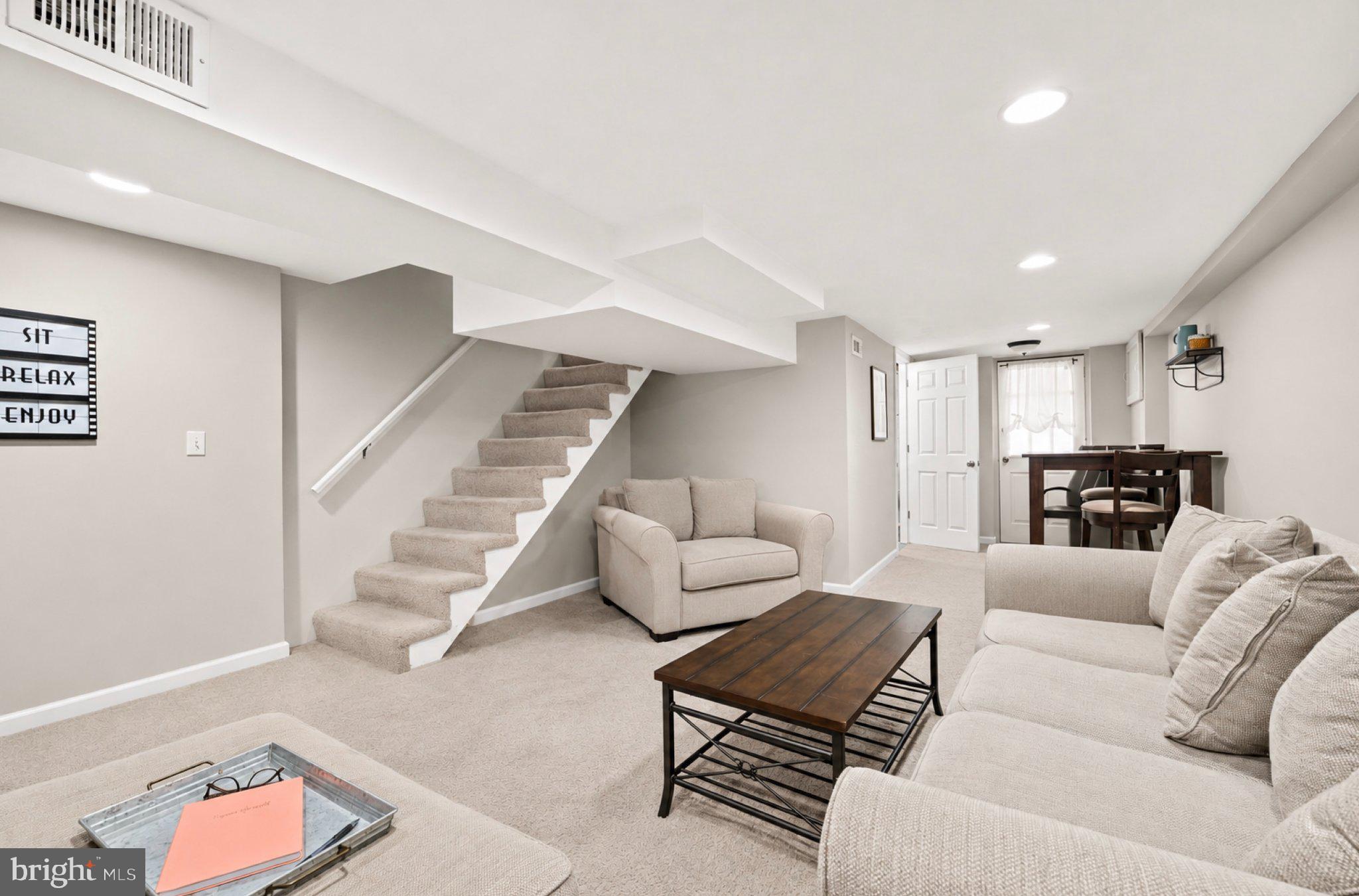 234 West Edgevale Road Baltimore, MD 21225 - Photo 18 of 45 Cozy basement retreat with modern charm.