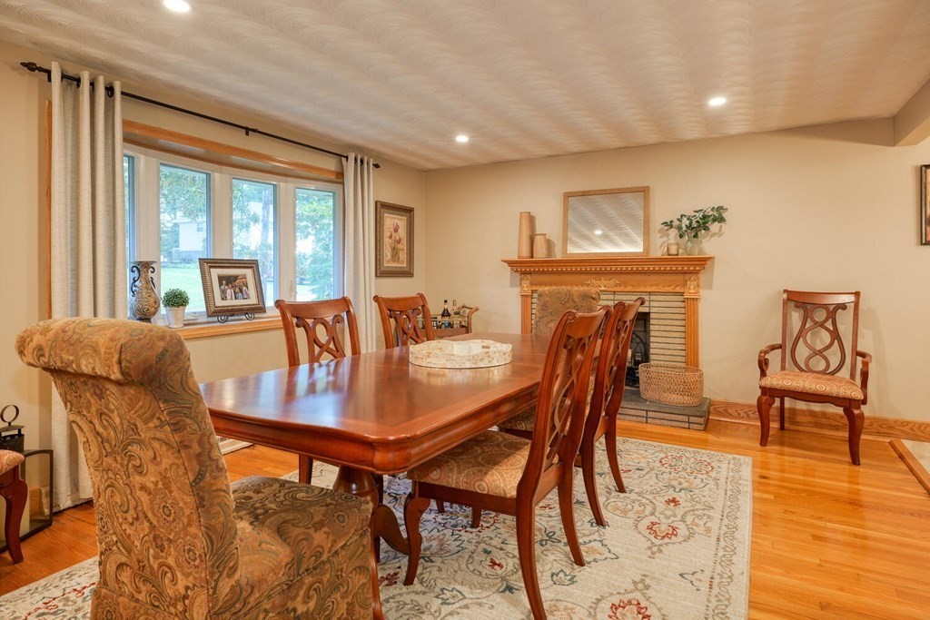 14 Princeton Road Burlington, MA 01803 - Photo 12 of 40 a dining room with furniture and wooden floor