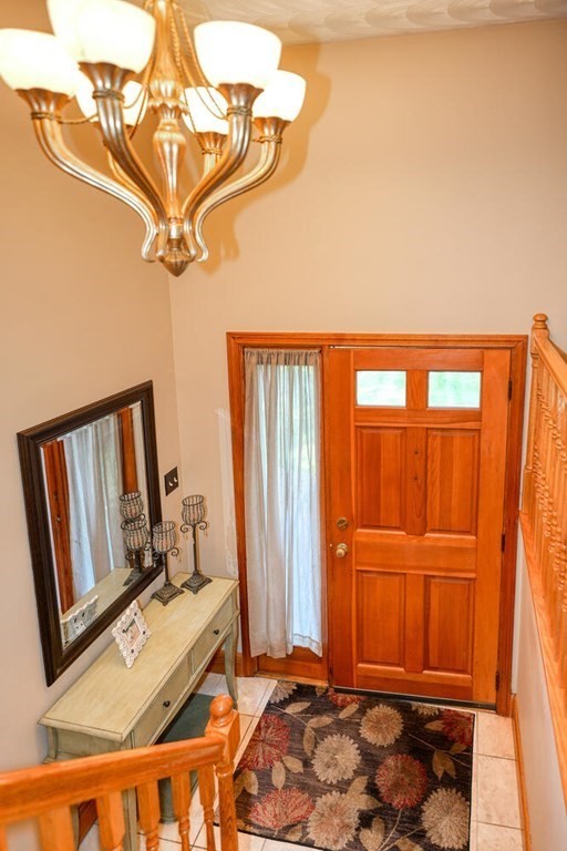 14 Princeton Road Burlington, MA 01803 - Photo 18 of 40 a view of a room with wooden floor and windows