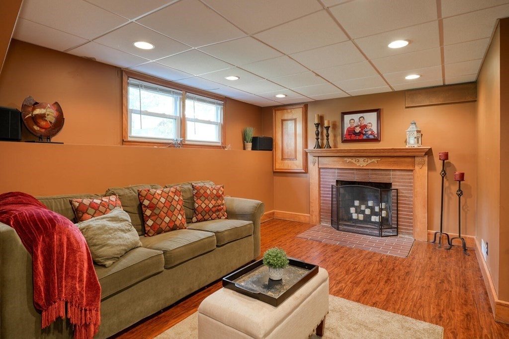 14 Princeton Road Burlington, MA 01803 - Photo 19 of 40 a living room with furniture and a fireplace