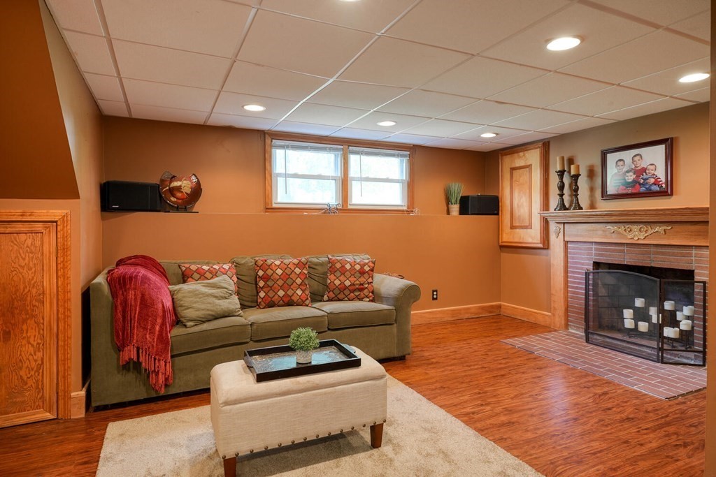 14 Princeton Road Burlington, MA 01803 - Photo 20 of 40 a living room with furniture and a fireplace