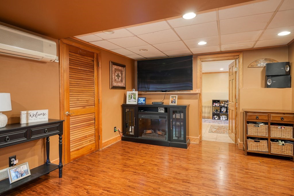 14 Princeton Road Burlington, MA 01803 - Photo 21 of 40 a view of a livingroom with kitchen and a fireplace