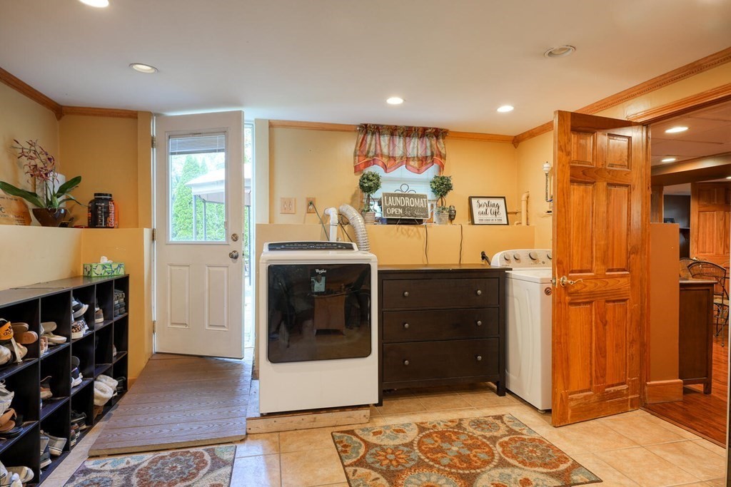 14 Princeton Road Burlington, MA 01803 - Photo 29 of 40 a kitchen with stainless steel appliances granite countertop a refrigerator and a stove