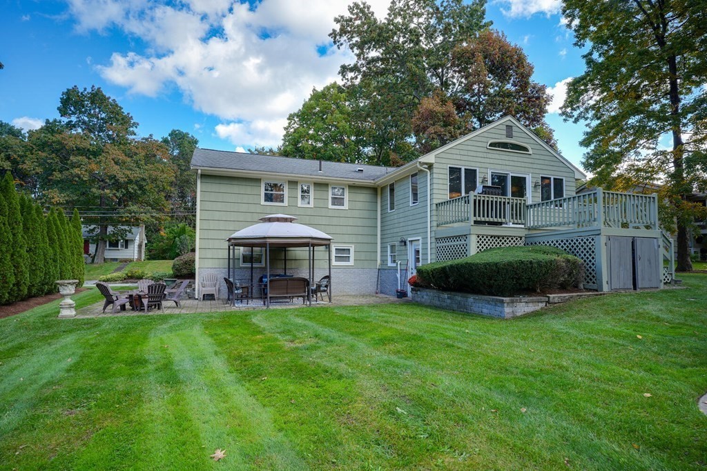 14 Princeton Road Burlington, MA 01803 - Photo 30 of 40 a front view of a house with a garden and trees