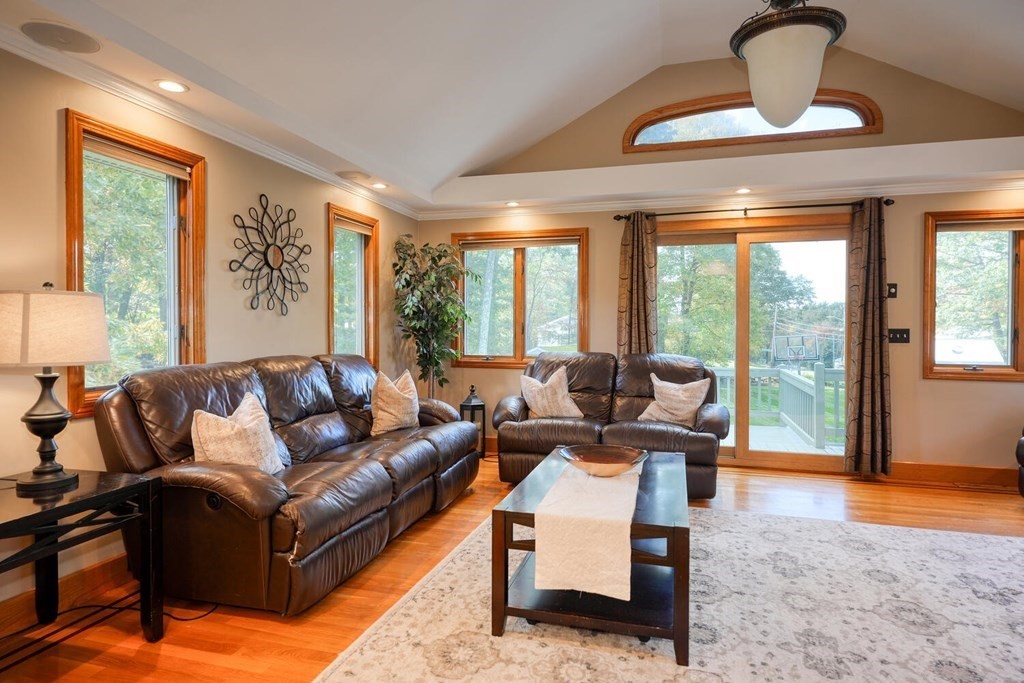 14 Princeton Road Burlington, MA 01803 - Photo 3 of 40 a living room with furniture and floor to ceiling windows