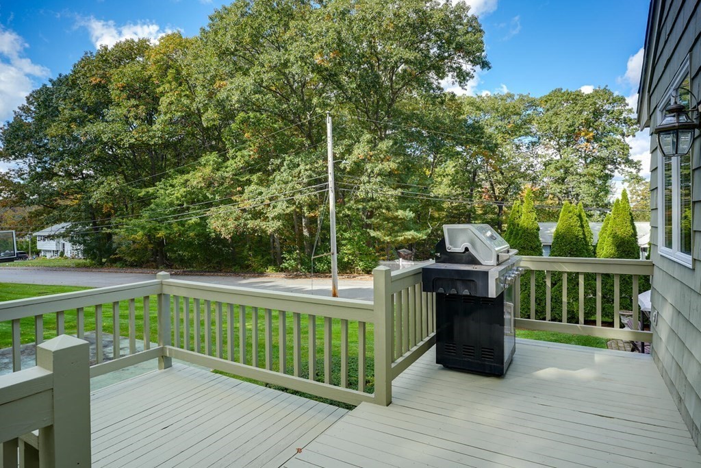 14 Princeton Road Burlington, MA 01803 - Photo 32 of 40 a view of a deck with couches and wooden floor
