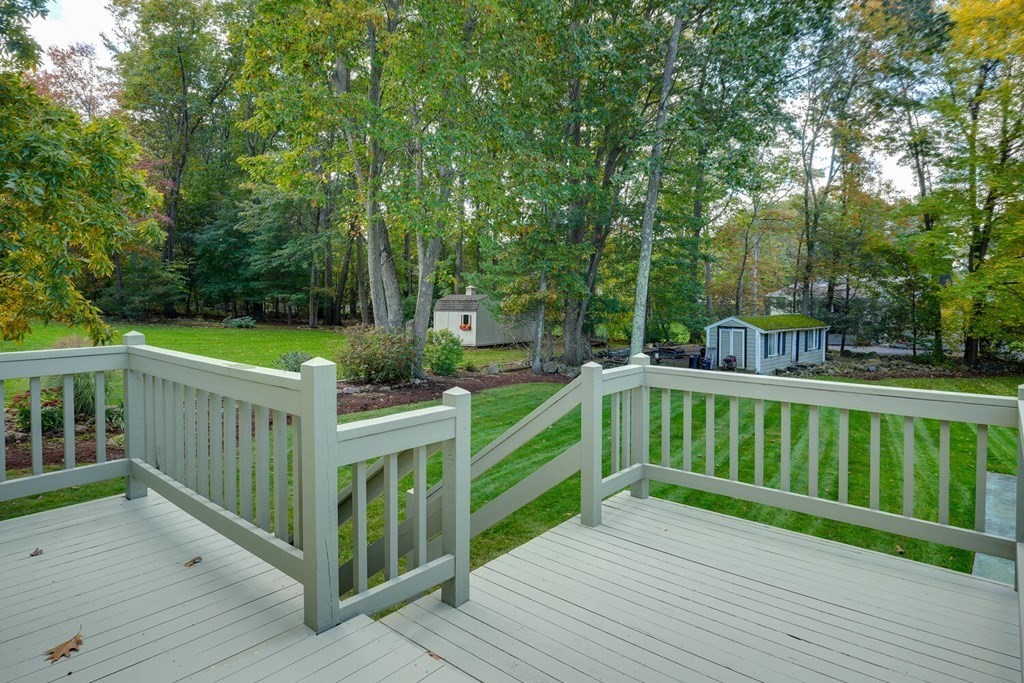 14 Princeton Road Burlington, MA 01803 - Photo 33 of 40 a view of an deck with chairs and a yard