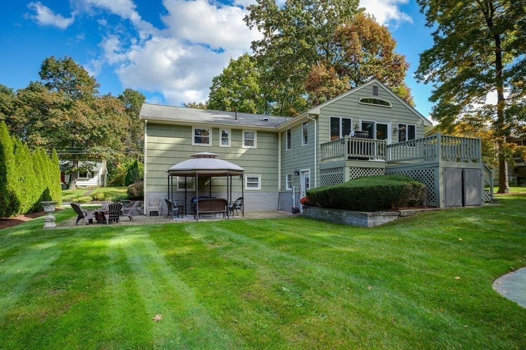 14 Princeton Road Burlington, MA 01803 - Photo 36 of 40 a front view of a house with a garden and plants