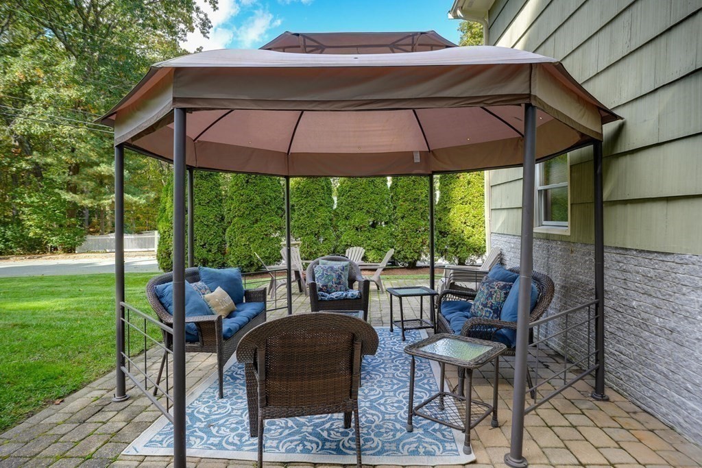 14 Princeton Road Burlington, MA 01803 - Photo 37 of 40 a patio with a yard table and chairs