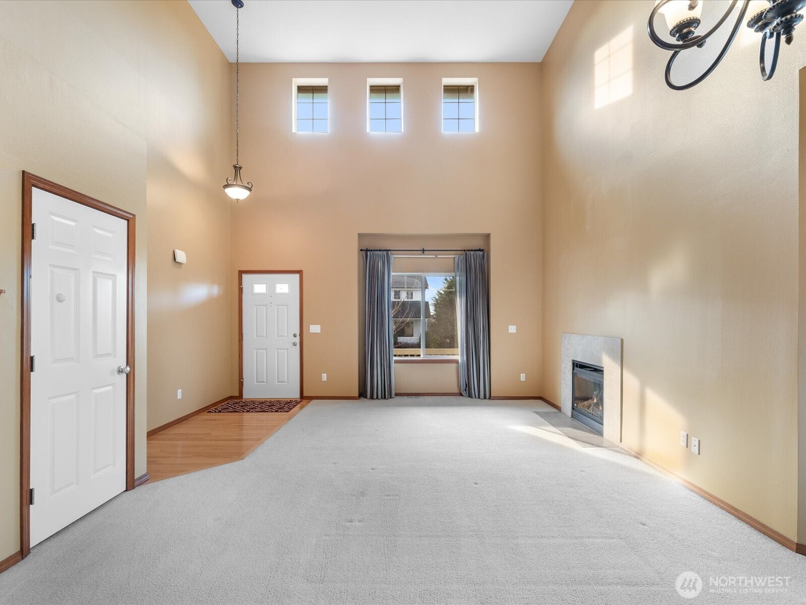 1824 23rd Street Snohomish, WA 98290 - Photo 17 of 38 a view of a big room with windows and chandelier