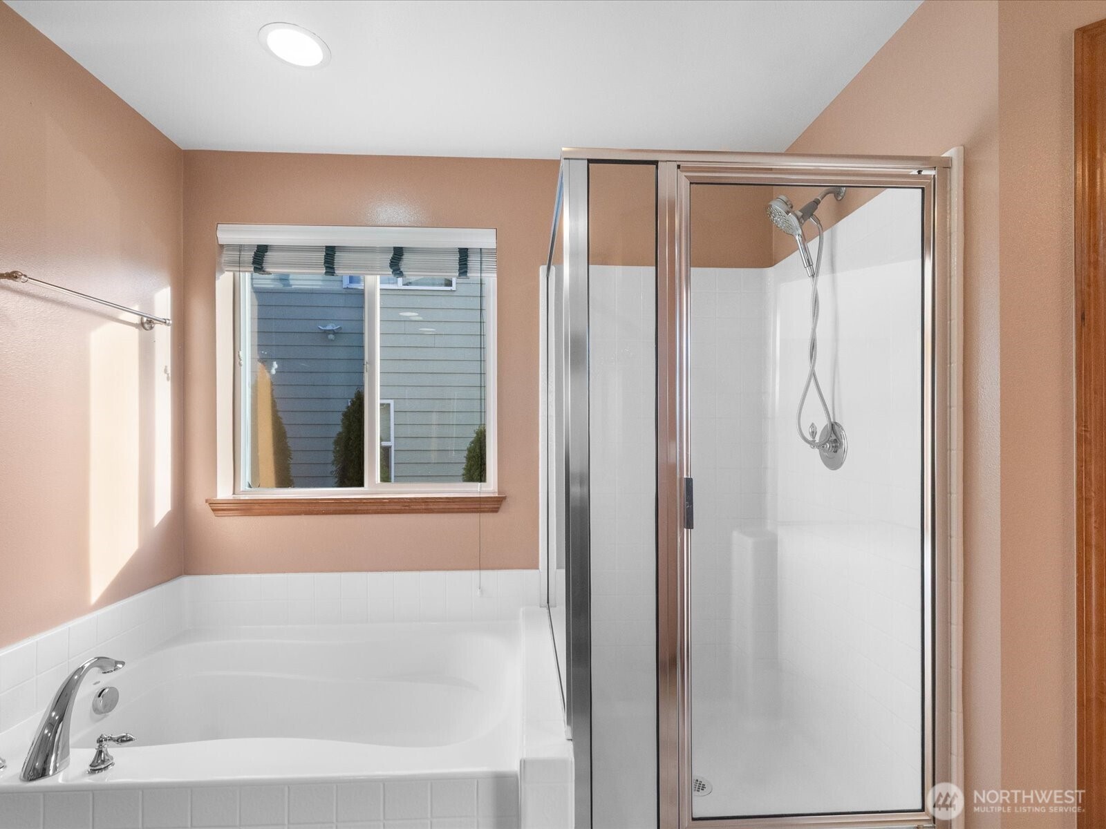 1824 23rd Street Snohomish, WA 98290 - Photo 31 of 38 a bathroom with a shower and a bathtub