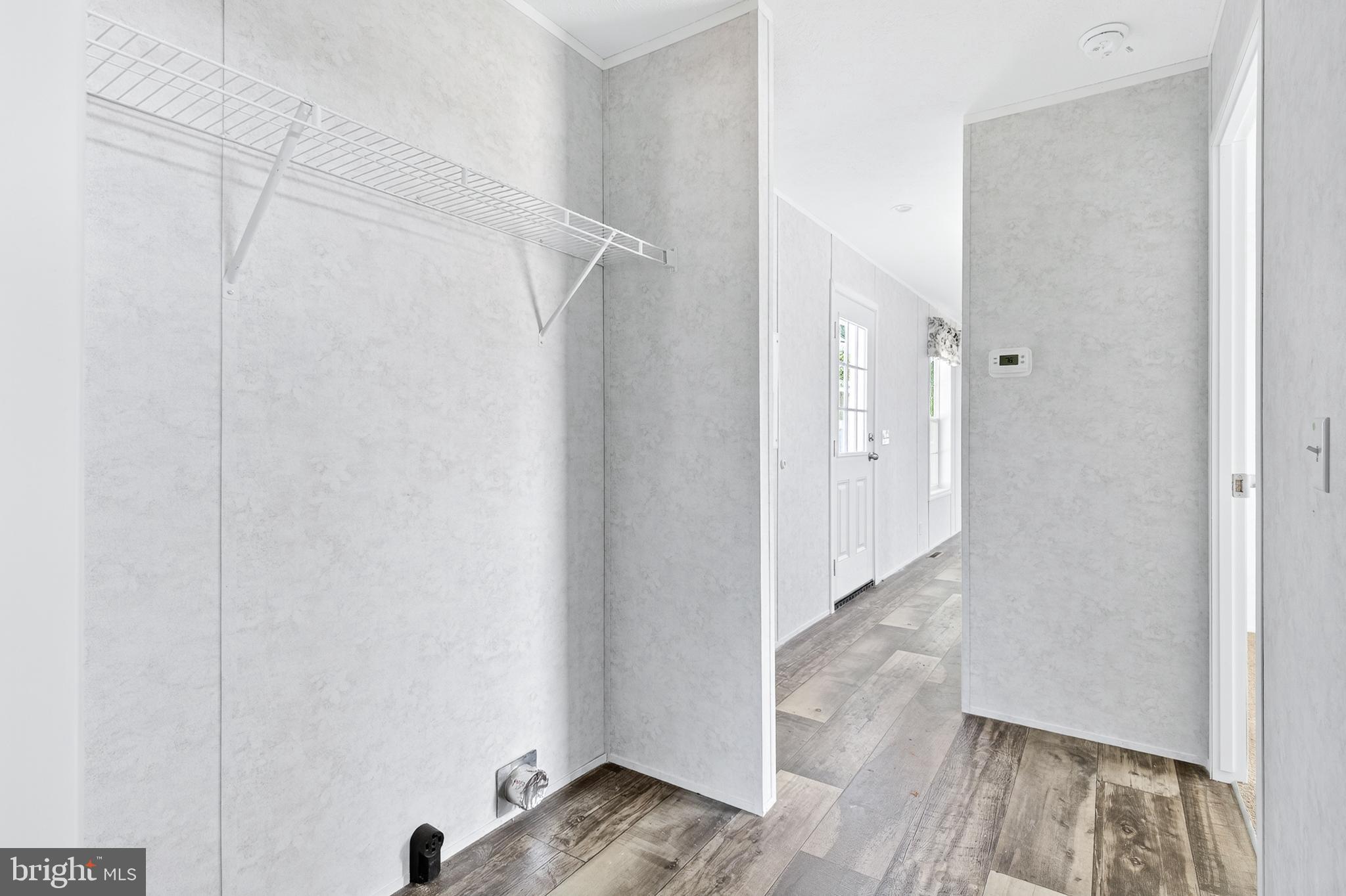 105 Bordic Road Reading, PA 19606 - Photo 11 of 26 a view of walk in closet with wooden floor