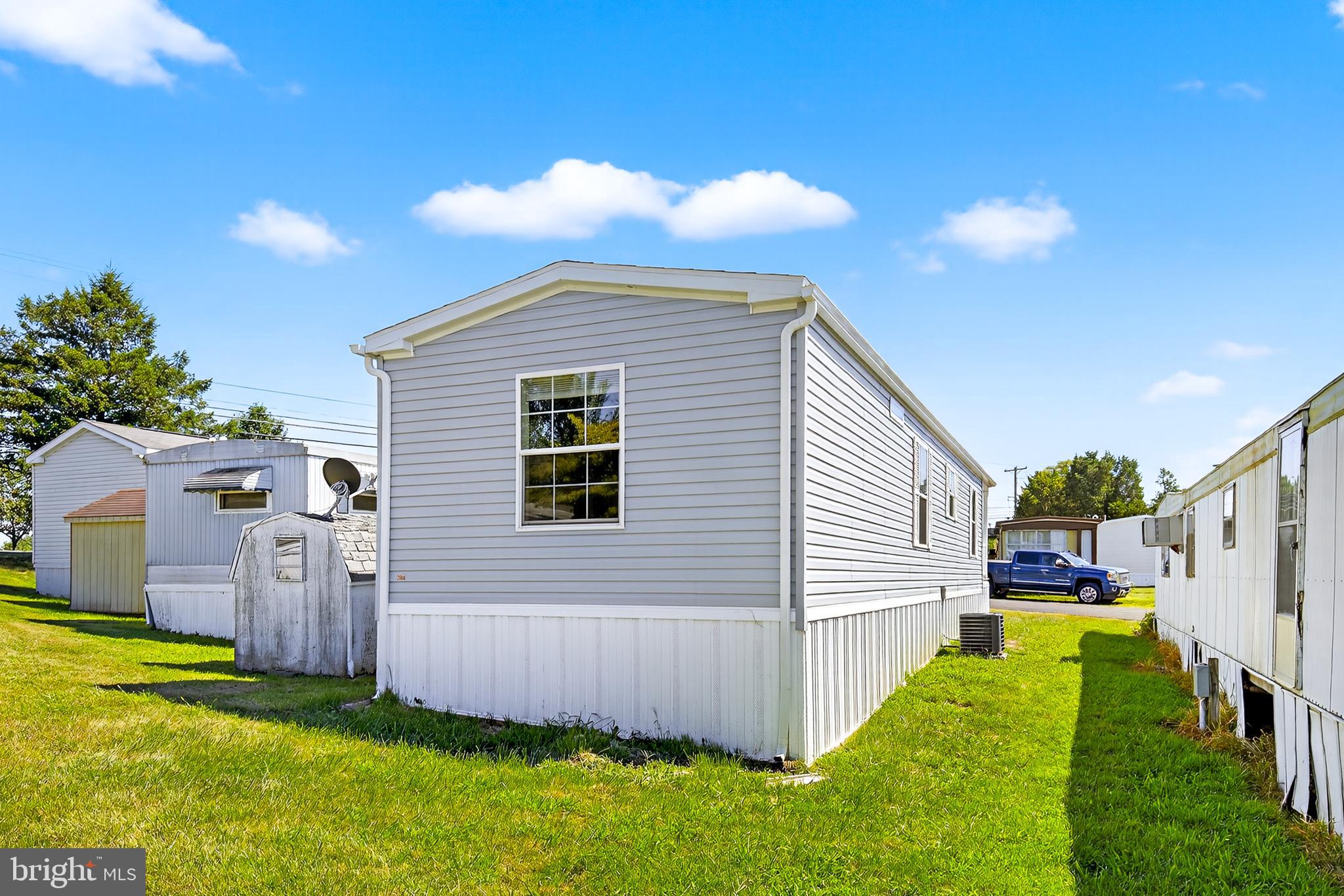 105 Bordic Road Reading, PA 19606 - Photo 2 of 26 a view of a house with a backyard and a patio