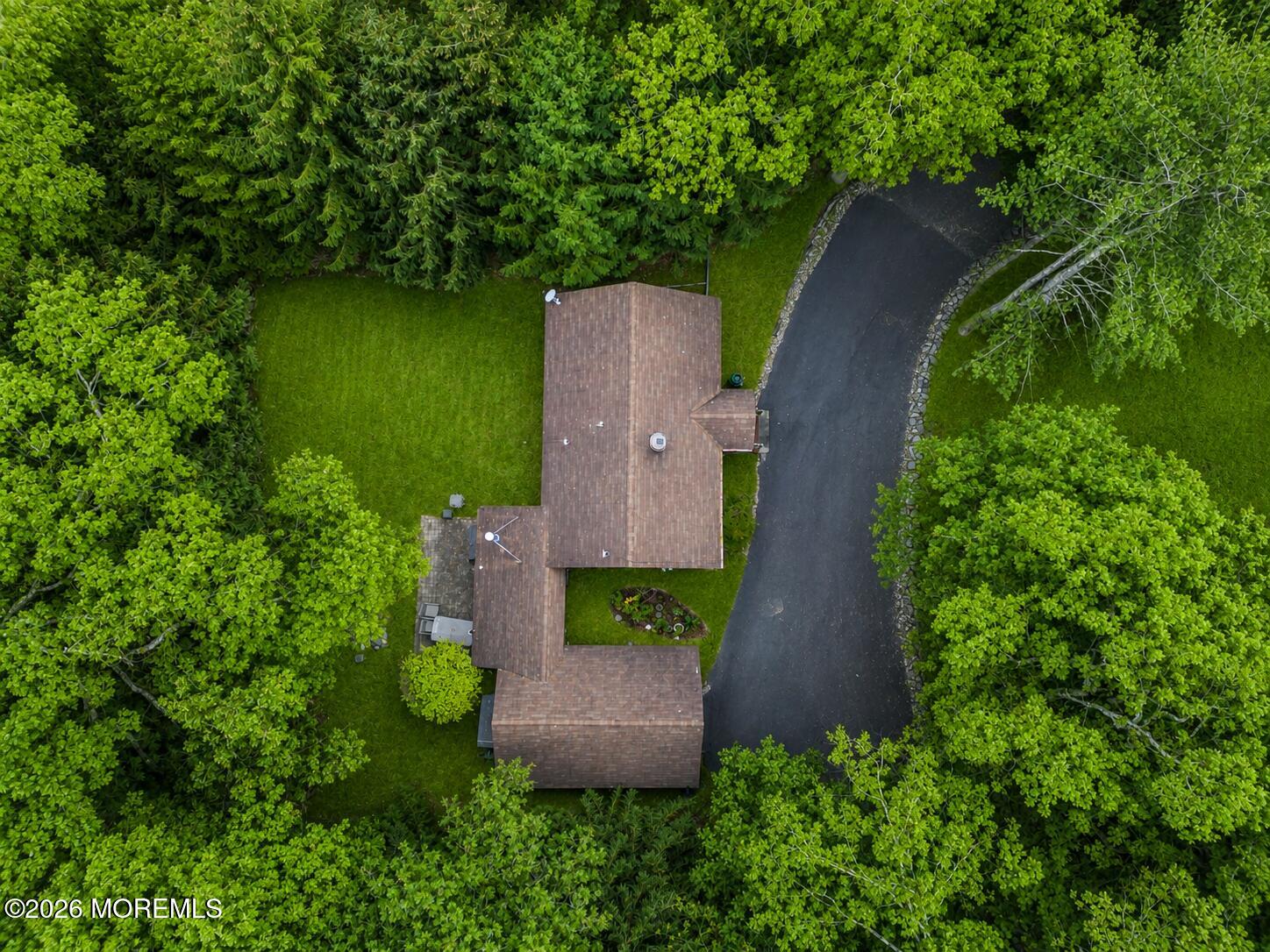 269 Alexander Avenue Howell, NJ 07731 - Photo 3 of 43 an aerial view of a house with a yard and a garden