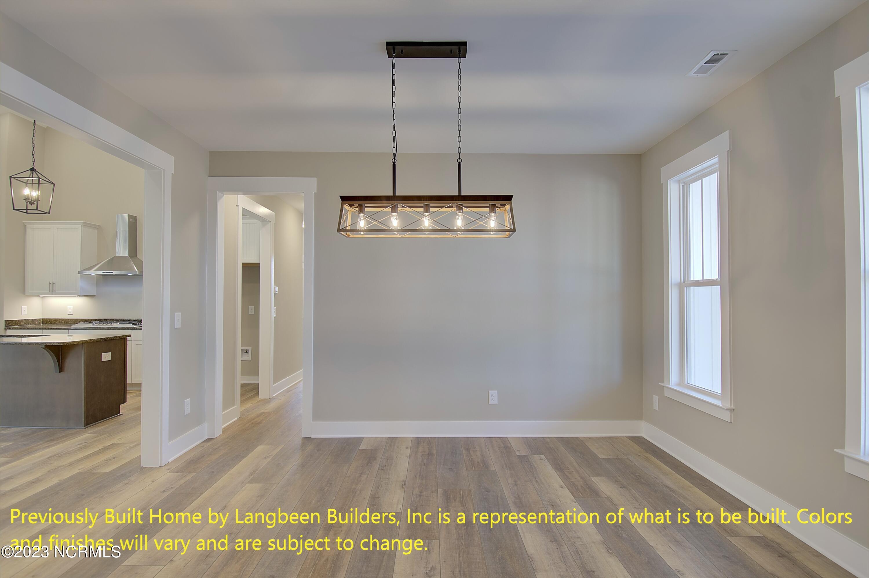 1032 Nicklaus Road Southport, NC 28461 - Photo 5 of 23 Previously Built Home by Langbeen Builders, Inc is a representation of what is to be built. Colors and finishes will vary and are subject to change.