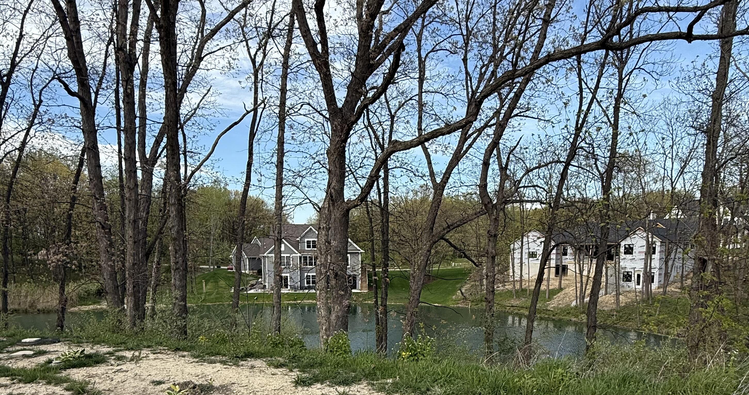 a lake view with lot of trees