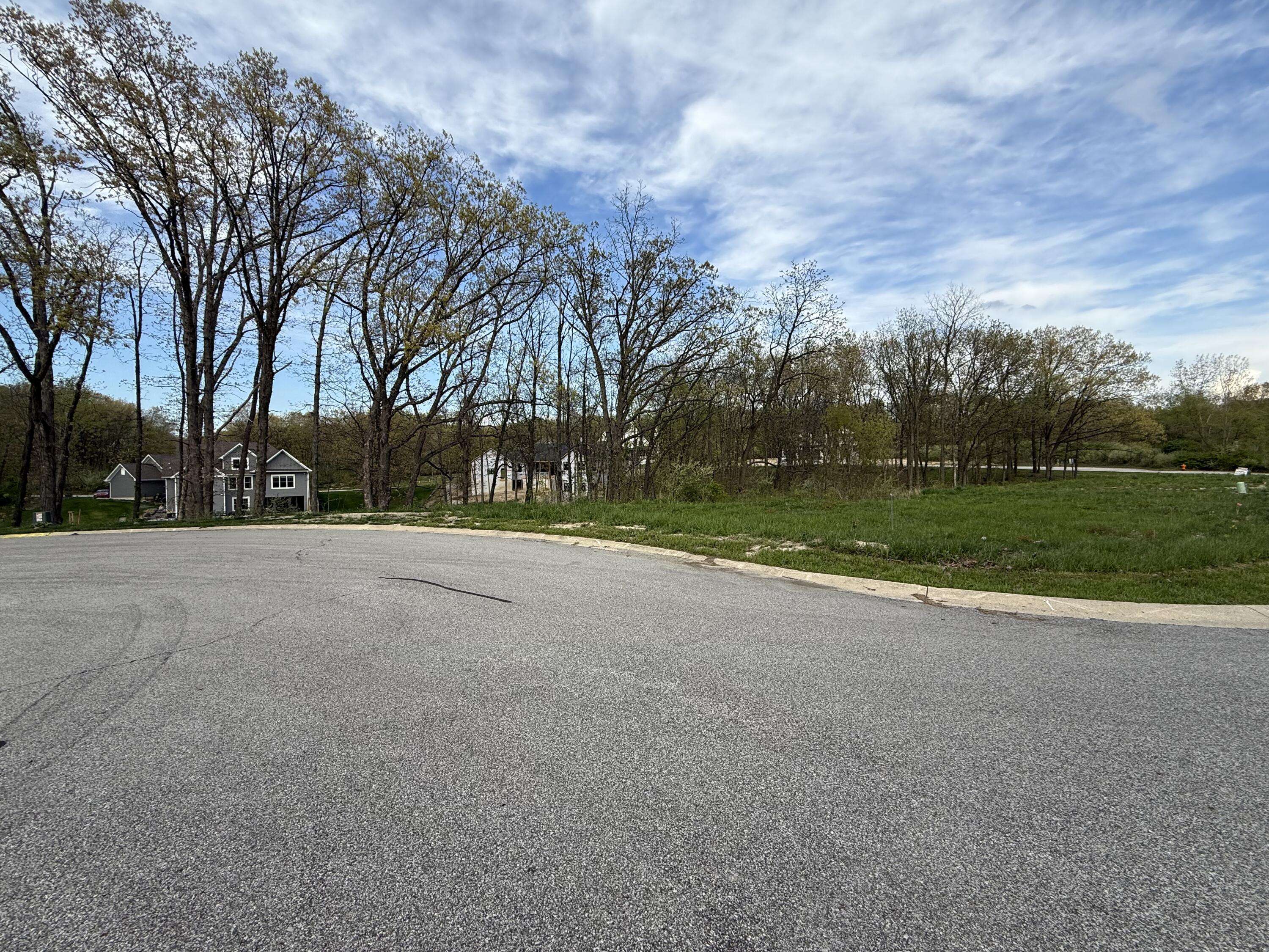 702 West Bay Court Crown Point, IN 46307 - Photo 2 of 6 a view of outdoor space with playground and green space