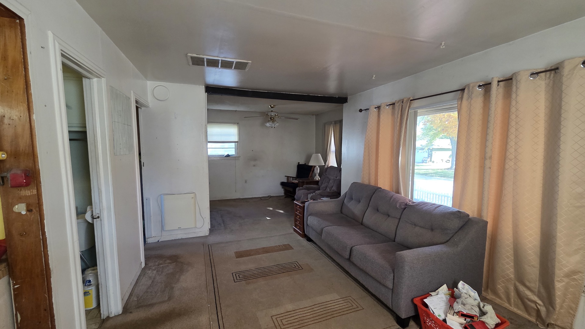 5313 Burwood Road Oakwood Hills, IL 60013 - Photo 17 of 28 a living room with furniture and a large window
