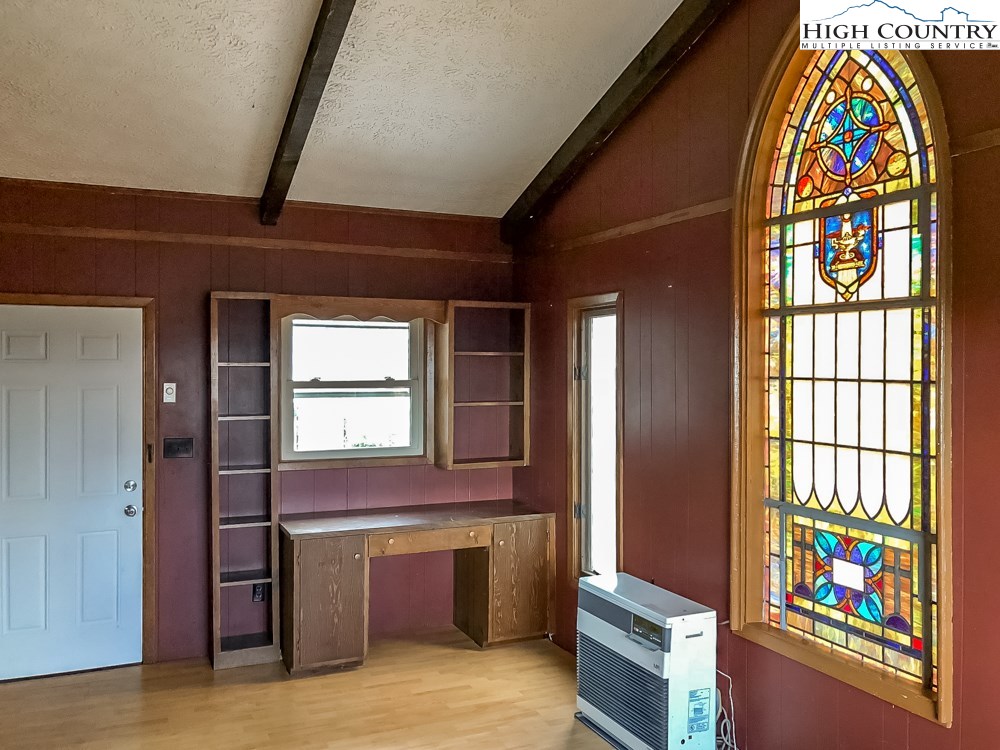 277 Rabbit Run Road, Unit A&B Boone, NC 28607 - Photo 15 of 19 a view of an entryway with a fireplace