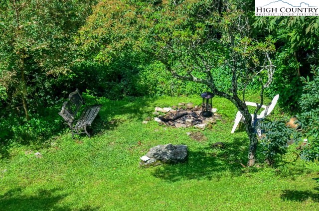 277 Rabbit Run Road, Unit A&B Boone, NC 28607 - Photo 6 of 19 a view of a lush green space