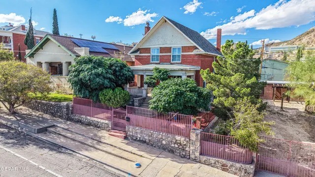 a kitchen with stainless steel appliances granite countertop a stove and more cabinets