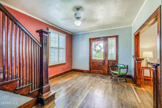 a kitchen with stainless steel appliances granite countertop a refrigerator and a stove