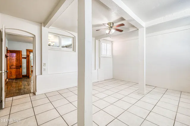 a view of an entryway with wooden floor and door