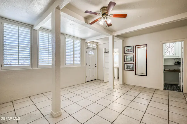 a view of a livingroom with a workspace