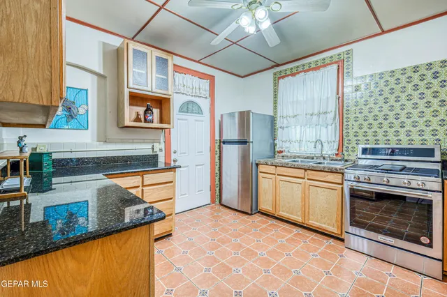 a view of a bench in a backyard