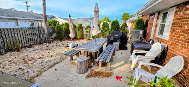 a view of an chairs and tables in the balcony